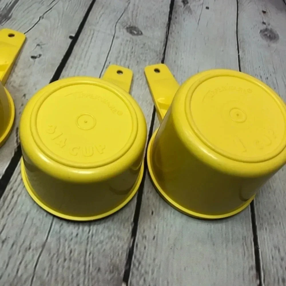Vintage Tupperware measuring cup set yellow - not full set